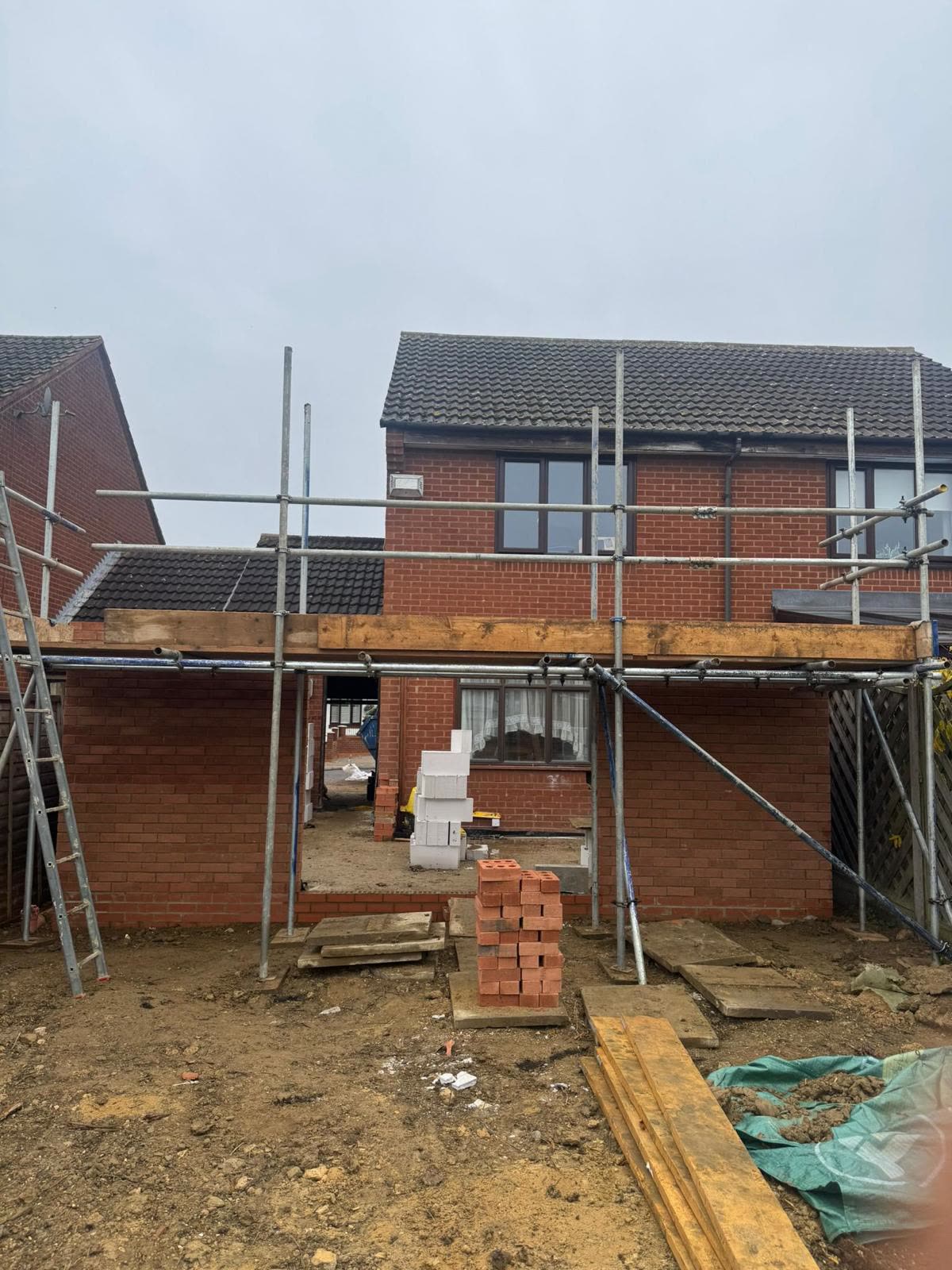 Recent Extension — 04 · Walls up to DPC